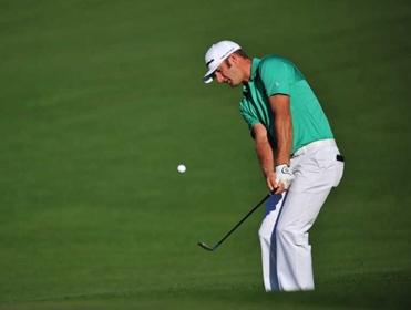 Can Dustin Johnson swap his green shirt for a Green Jacket?
